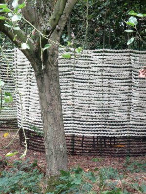 MANY A LONG DAY... hand spun and crochet strips of coarse lace, willow sticks, chair, table, crochet needle, basket with yellow poppies ©Ine van Son 2018