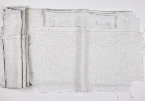 Tucked In, 2020, approx. 33x57cm, linen remnant stitched, ironed&folded