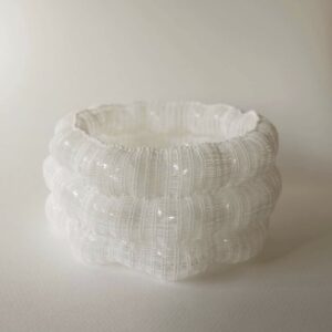 Work_10_CAST, 2022, 16x15x8 cm, elastic yarn, bubble wraps_compressed